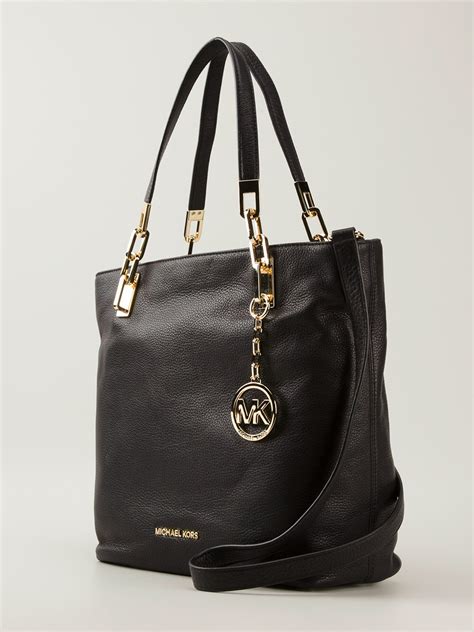 michael kors black and white logo|Michael Kors black shoulder bag.